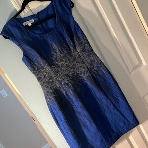 Kay Unger blue dress cap sleeve. Very faint underarm discolor-see pics. Size 8